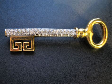 givenchy golden key pin brooch new york 1977|GIVENCHY VINTAGE 1977 GOLD TONE SKELTON KEY .